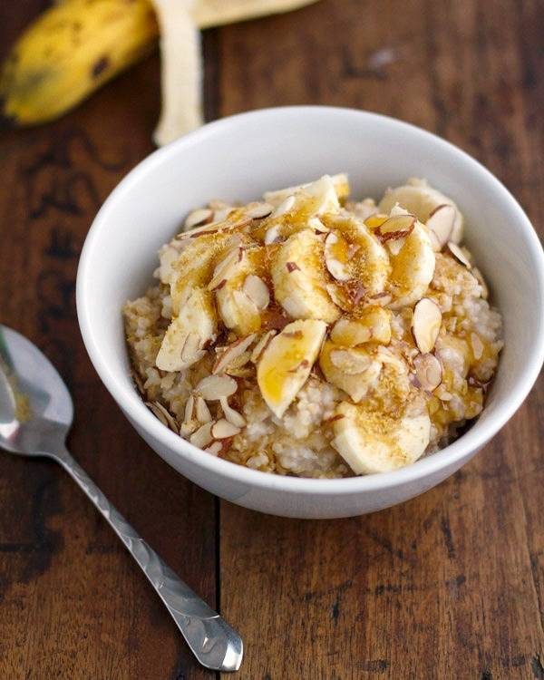 Steel cut oats in a white bowl.