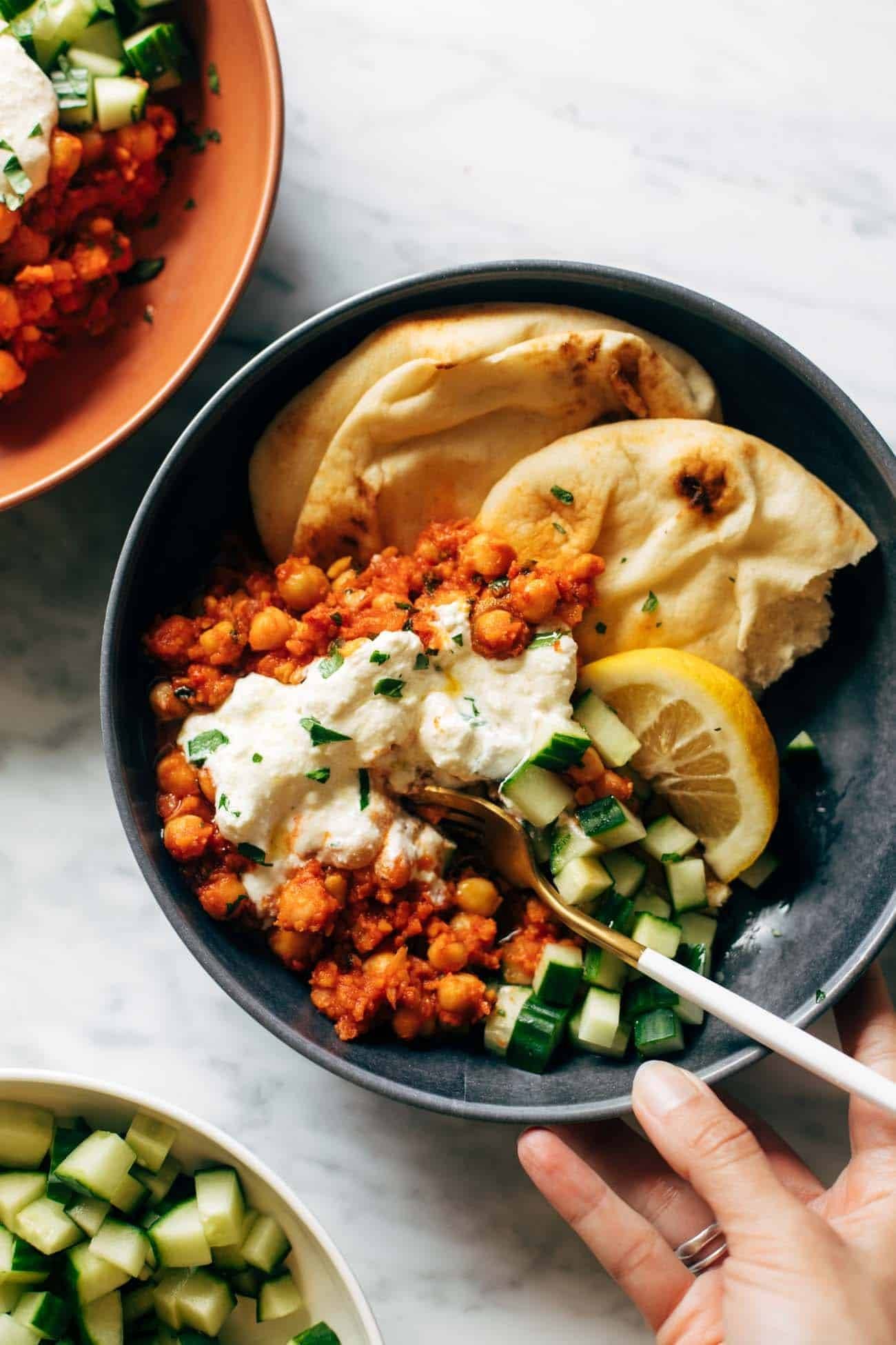 Harissa chickpeas with whipped feta and naan.