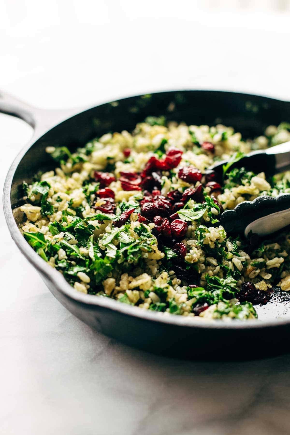 Garlic Kale and Brown Rice Salad with a zippy lemon herb dressing! This side dish recipe is so simple and it compliments almost any main dish! | pinchofyum.com Garlic Kale and Brown Rice Salad with a zippy lemon herb dressing! This side dish recipe is so simple and it compliments almost any main dish! | pinchofyum.com