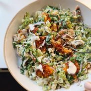 Crispy smashed potato salad in a bowl.