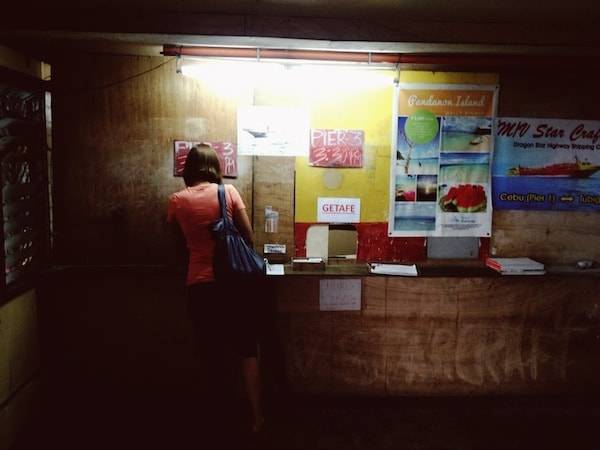 Woman looking at a wall.