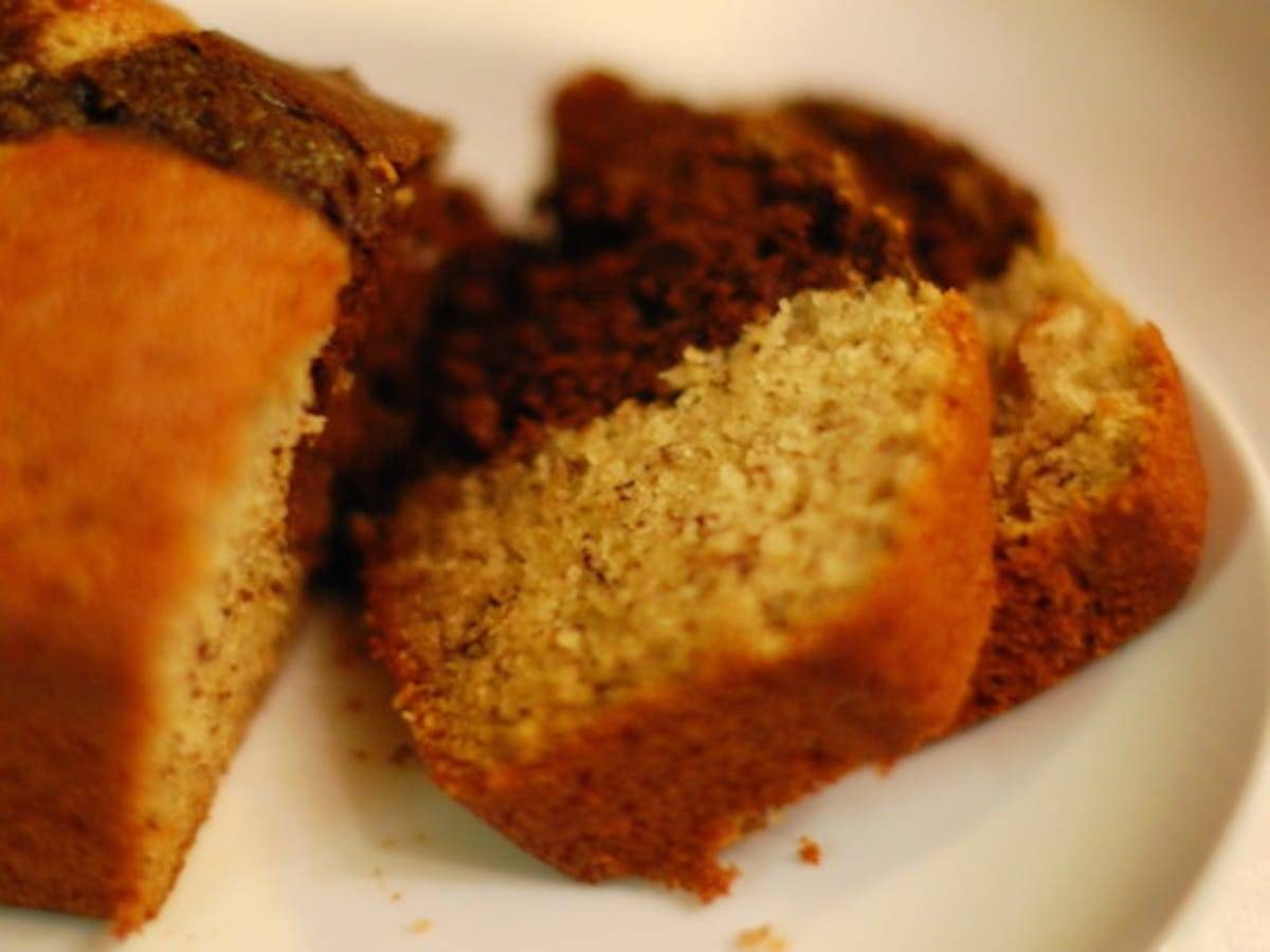 Chocolate checkered banana bread sliced into three pieces.