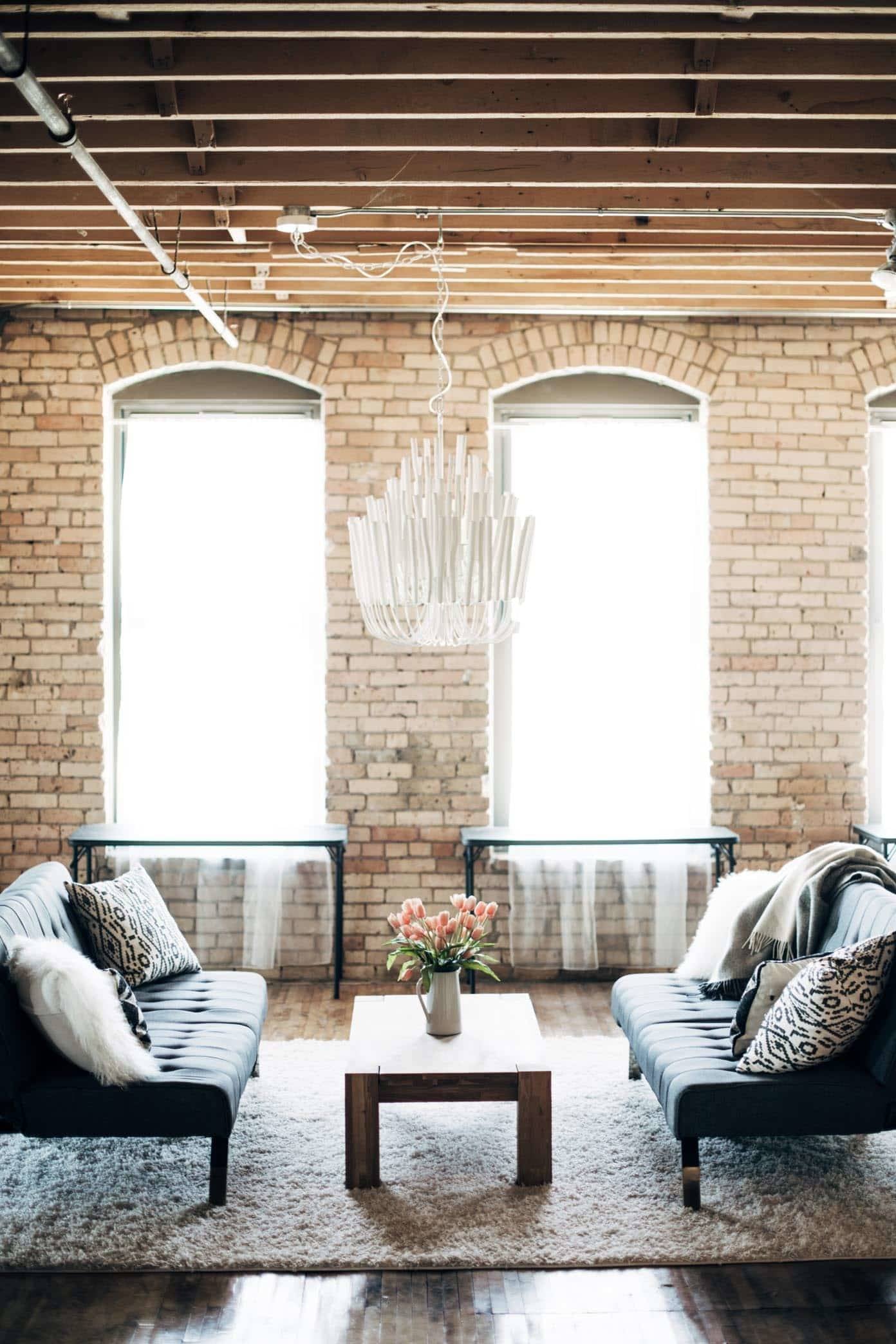 Studio with futons and a coffee table.